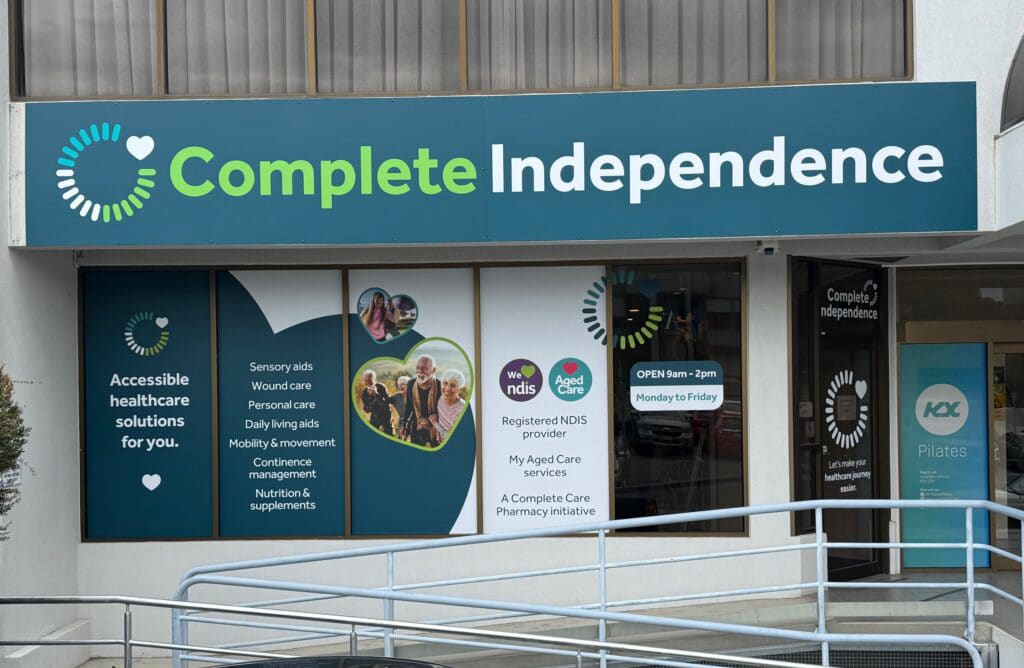 Registered nurse consulting with client about mobility aids at Eastern Shore showroom